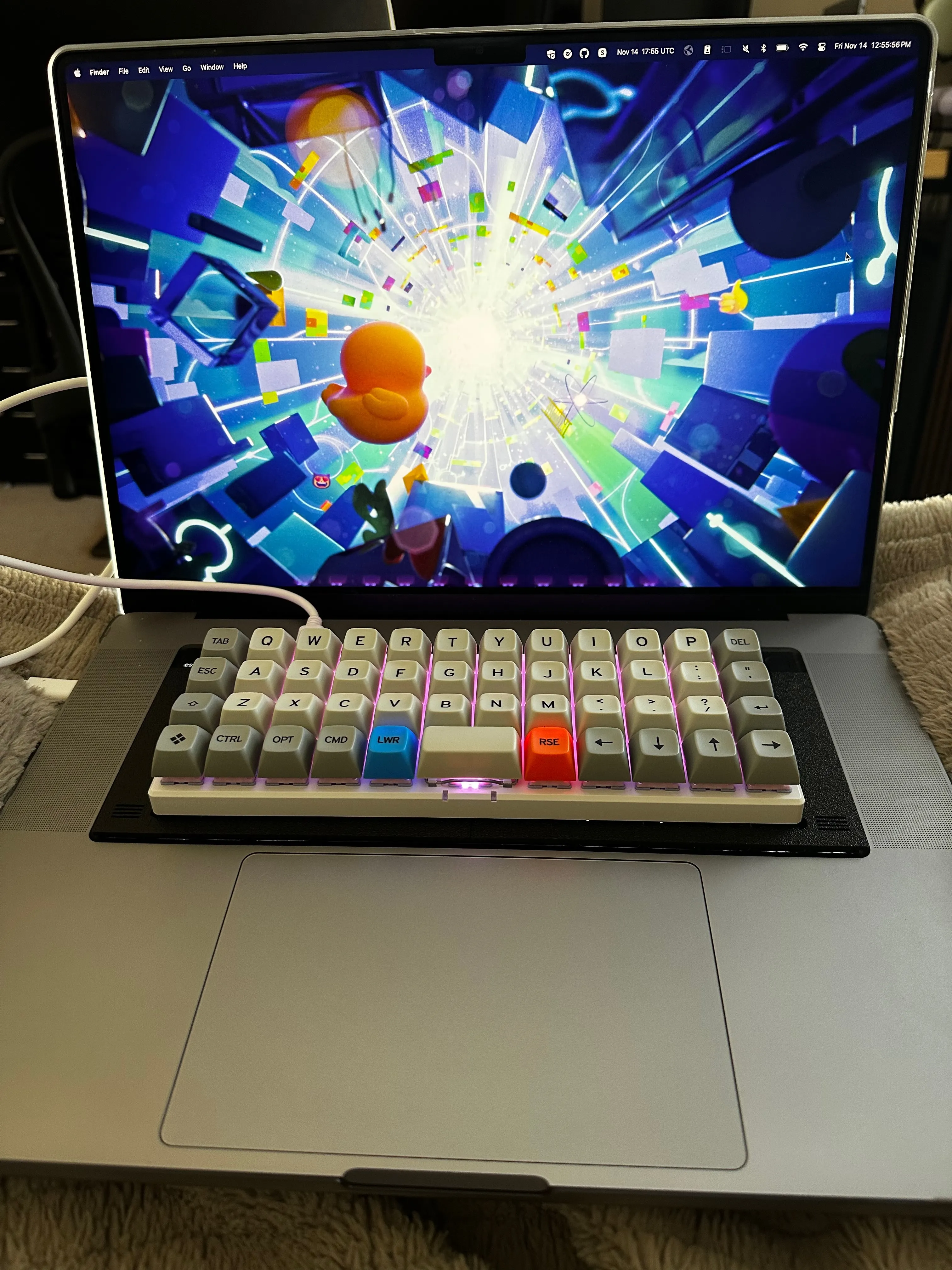 Planck keyboard sitting on a Mac keyboard